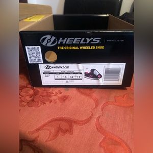 Girl Heelys.